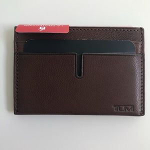 Brown leather Tumi card case